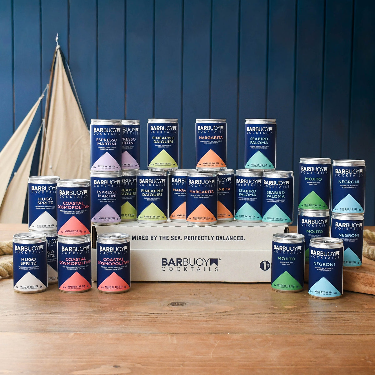 Party Set: Bar Buoy cocktail cans stacked on and around the box