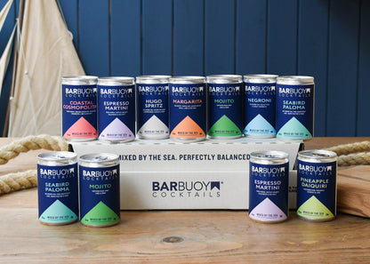 Sharing Set: Bar Buoy cocktail cans on and in front of the gift box